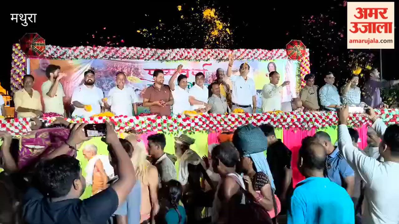 Devotees Showered with Flowers at Govardhan Mudiya Purnima Fair