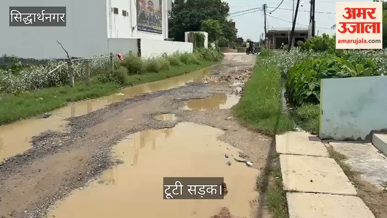 Water-filled potholes on the road have increased commuting difficulties.