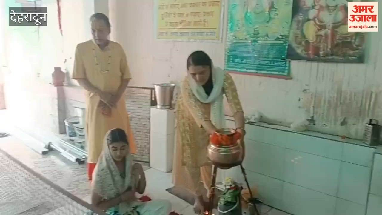 Dehradun:Shiva devotees performing Jalabhishek of Shivling at Durga Mata Temple in Banjarawala on the occasion of Sawan festival
