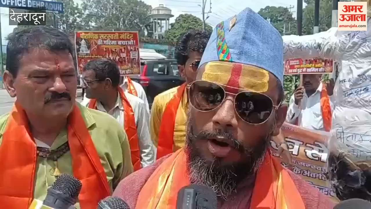 Dehradun:Bhairav Sena protests and burns an effigy against the alleged desecration of an ancient temple in Mana village