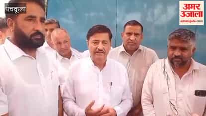 Rajesh Thakural, Chairman of the State Traders' Association, listened to the grievances of traders and commission agents at the Barwala grain market.
