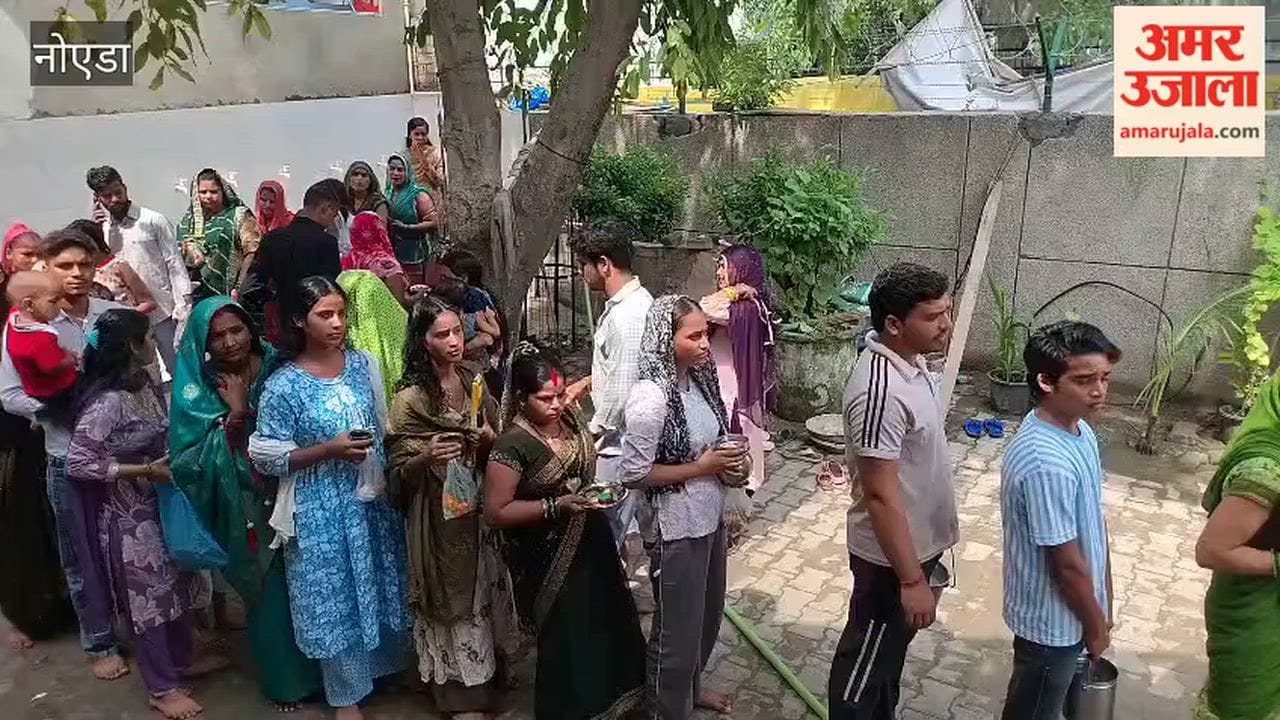 Noida: Long queues of devotees at the ancient Shiva temple in Sarfabad on the first Monday of Sawan.