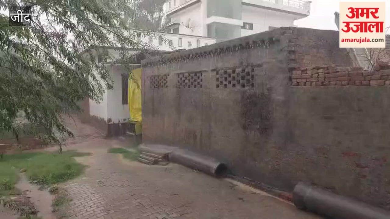 Residents of Dumarakha Kalan in Narwana get relief from the heat following rain.
