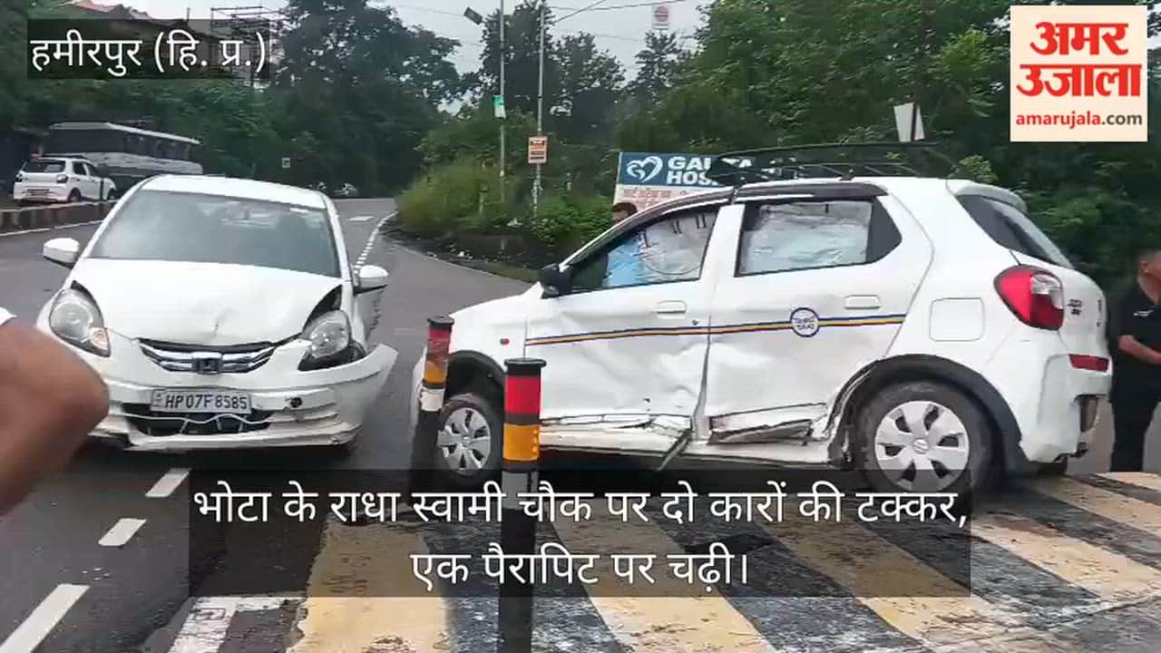 Two cars collided at Radha Swami Chowk in Bhota, one climbed onto the parapet.