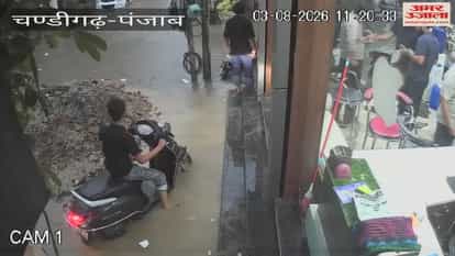 Heavy rain causes accident on Aggarwal Street; bike falls into ditch; two youths rescued safely