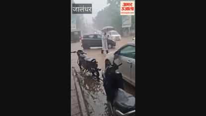 Heavy rain causes accident on Aggarwal Street; bike falls into ditch; two youths rescued safely