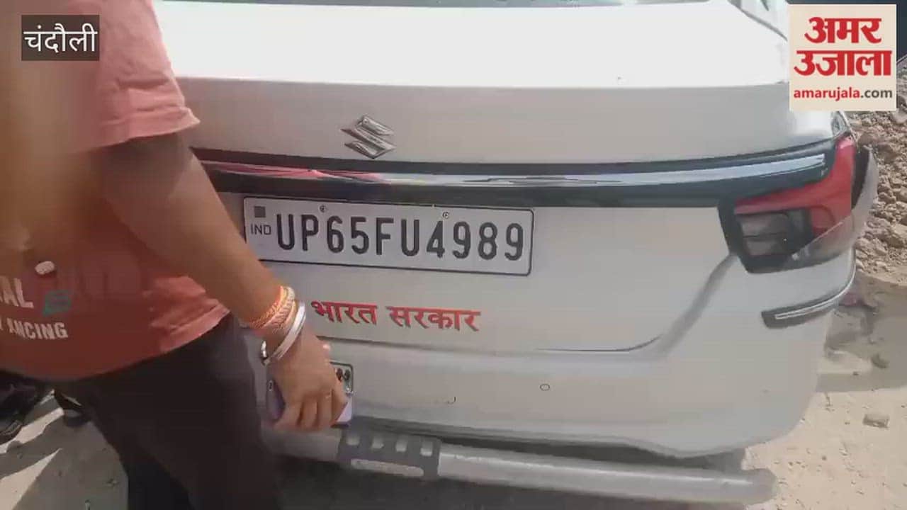 Baleno car climbs onto a mound of earth amidst road widening work; overturning causes chaos