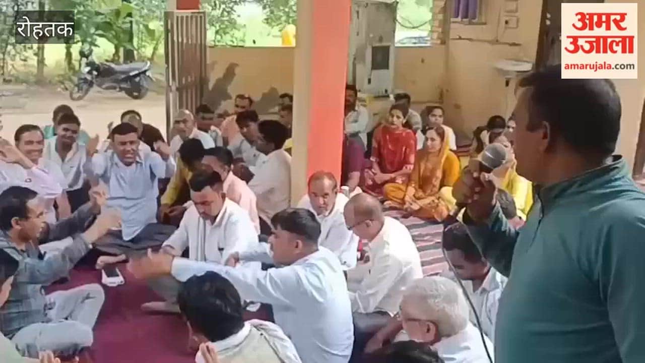Electricity department employees staged a protest in Meham, Rohtak.