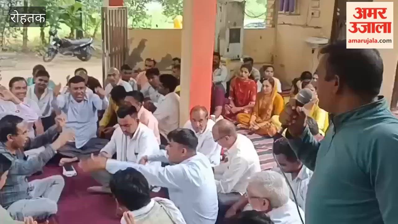 Electricity department employees staged a protest in Meham, Rohtak.
