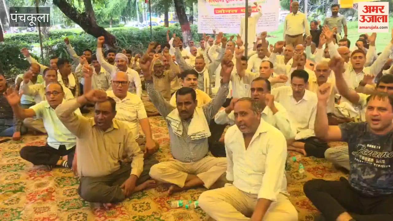 Haryana Tourism employees staging a sit-in protest outside Red Bishop in Panchkula Sector 1.