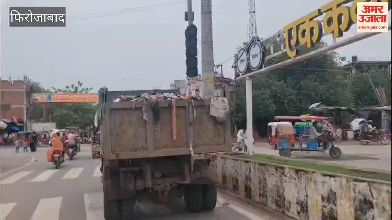 'Hell' amidst the garbage heaps! Sanitation workers at Firozabad's MRF plant are working with bare hands and feet.