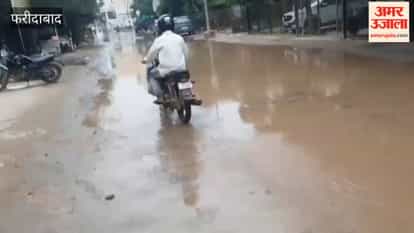 Faridabad: Waterlogging on a dilapidated road in Sector 81 makes it difficult for residents to leave their homes.
