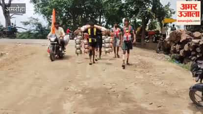 atin is bringing a *Kanwar* from Haridwar with a group, praying for his brother to get a job.