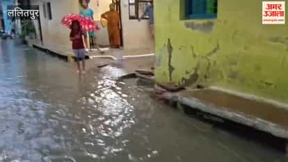 Streets brimmed with rainwater; roads were flooded.