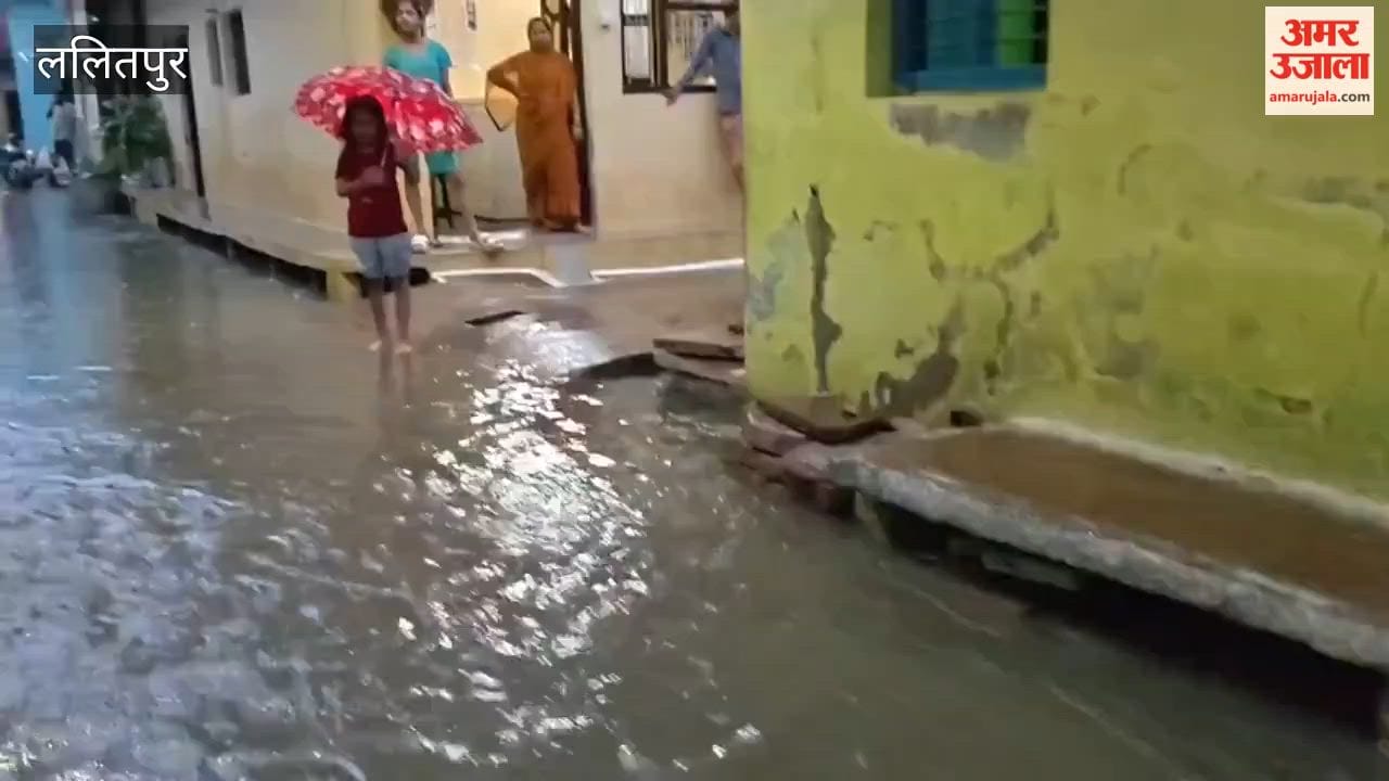 Streets brimmed with rainwater; roads were flooded.