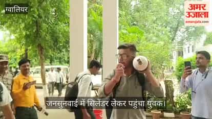 Electricity department employee's son arrives at public hearing with an oxygen cylinder.