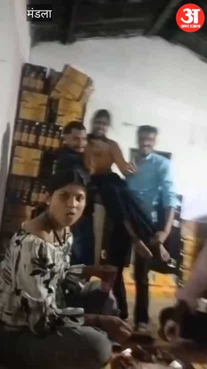Drinks and dancing amidst crates of liquor! Video of alleged liquor warehouse in Anjaniya goes viral