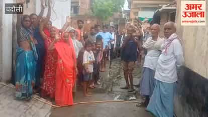 Drainage clogged, causing sewage to flow onto the road; residents of Nai Basti express their anger.