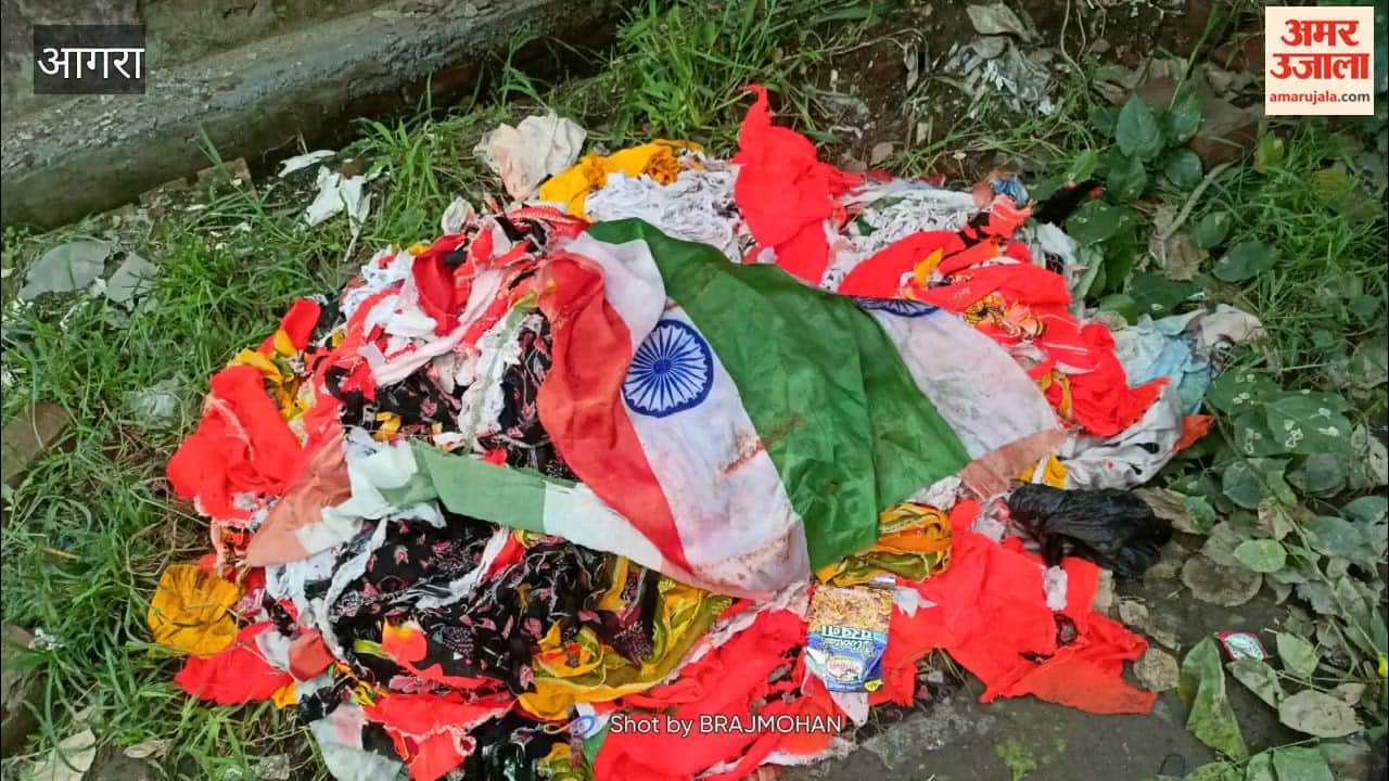 Hundreds of tricolour and saffron flags were found in a dustbin in the Sikandra Industries area