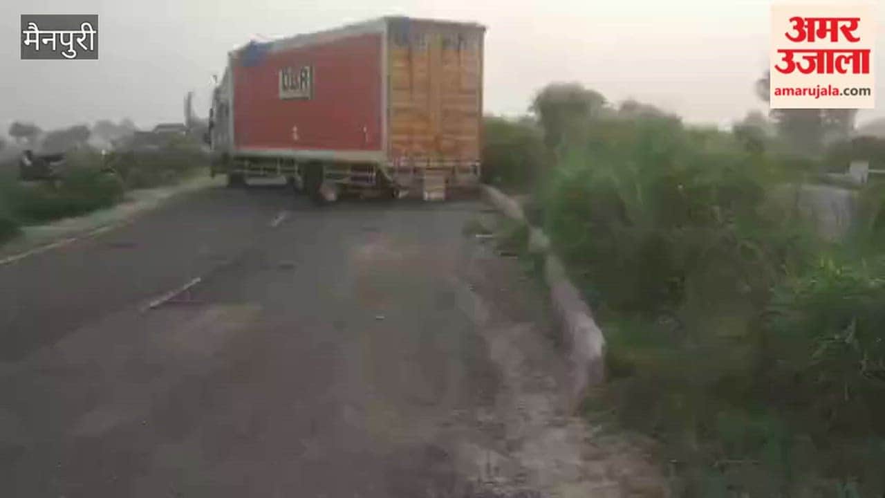 Container mounts divider near sharp curve in mainpuri