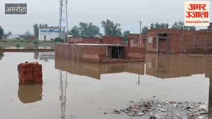 Rain starting in the morning caused waterlogging; people found relief from the heat.