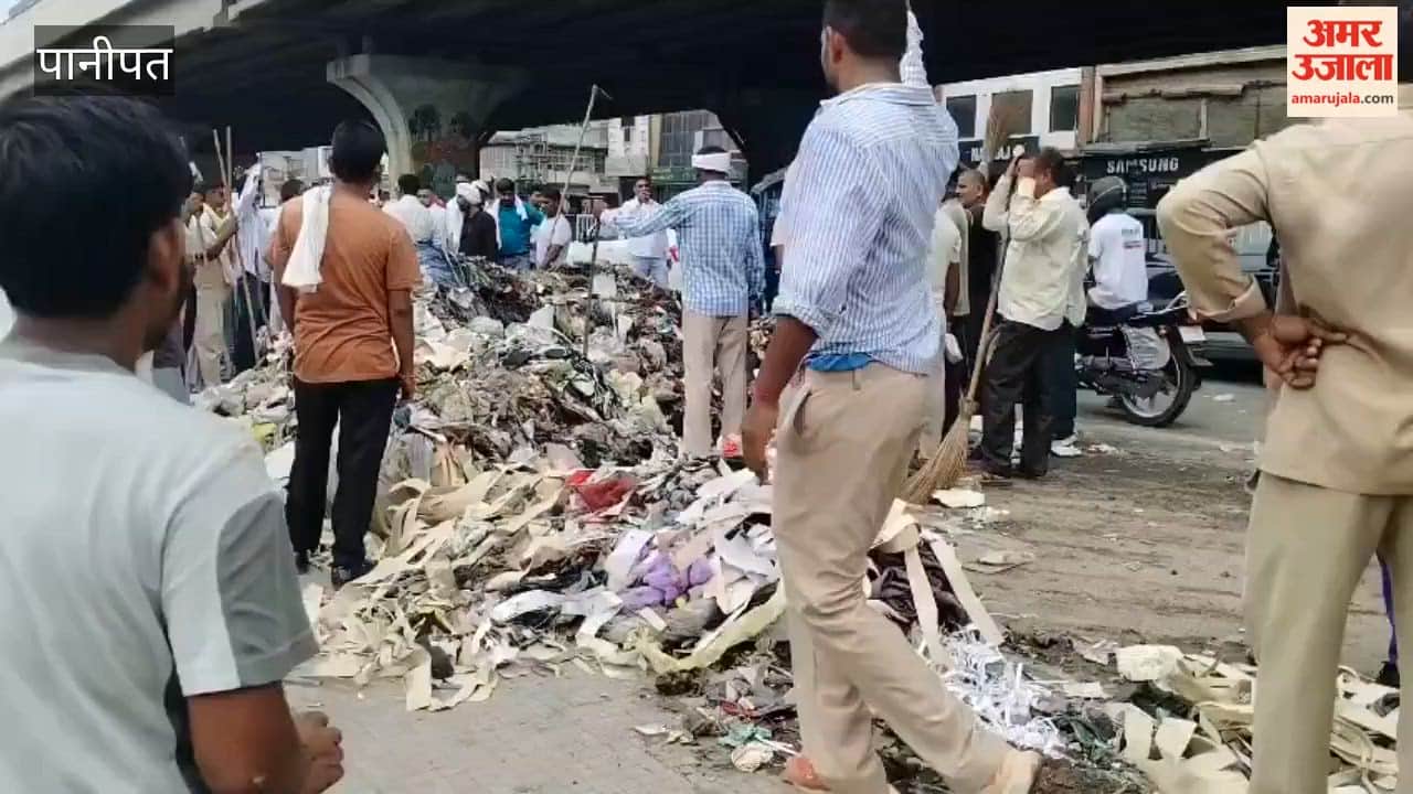 Municipal corporation employees stage a fierce protest in Panipat; dump garbage on GT Road and outside the MLA's office.