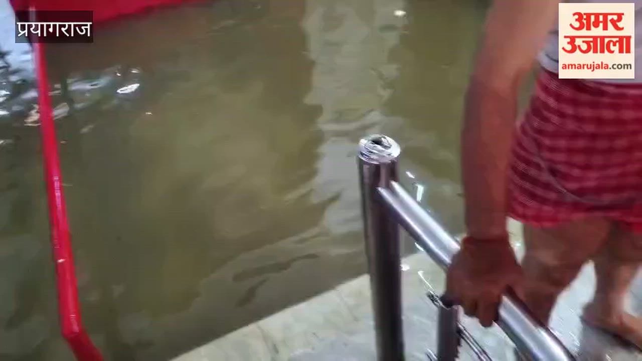 Waterlogging at Kali Bari Temple due to rain and sewer backflow.