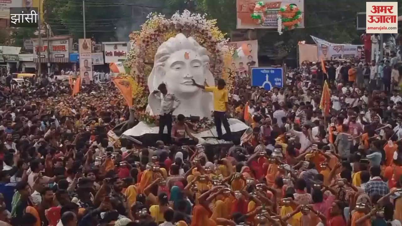 A sea of Lord Shiva's devotees surged during the Kanwar Yatra; flower petals were showered from a helicopter.