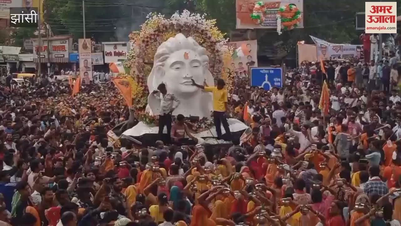 A sea of Lord Shiva's devotees surged during the Kanwar Yatra; flower petals were showered from a helicopter.