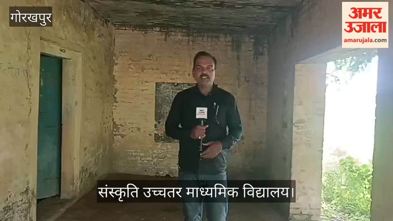 Dilapidated state of a school in Bansgaon; photo of Gandhi ji on a broken wall.