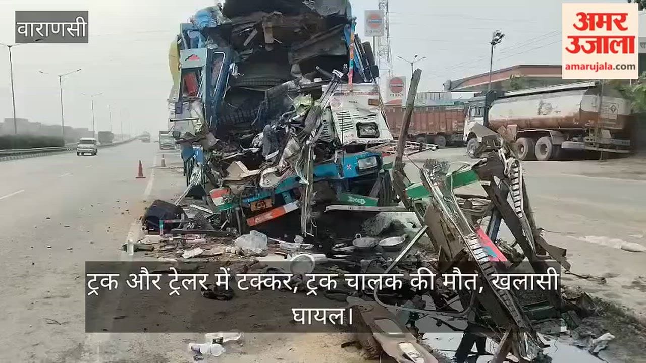 Collision between truck and trailer; truck driver killed, helper injured