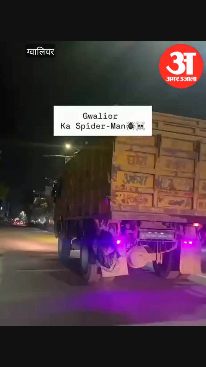 Youth performs dangerous ‘Spider-Man’ stunt in Gwalior; hangs onto the back of a dumper truck for a reel.
