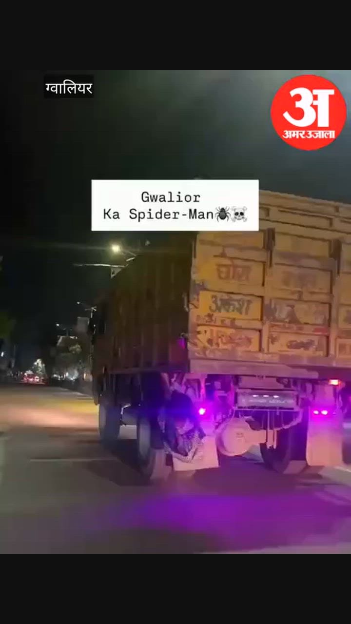 Youth performs dangerous ‘Spider-Man’ stunt in Gwalior; hangs onto the back of a dumper truck for a reel.