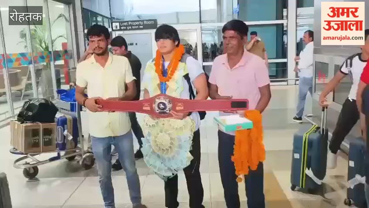 Team returning to Delhi Airport after winning 5 medals at the World Wrestling Championship in Rohtak receives a welcome; villagers from Morkheri felicitate Coach Pradeep