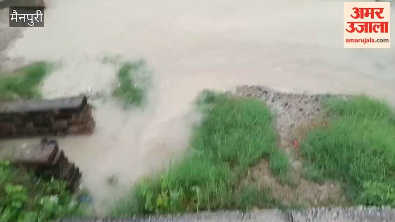 Roads submerged and drain water entered homes following two hours of rain