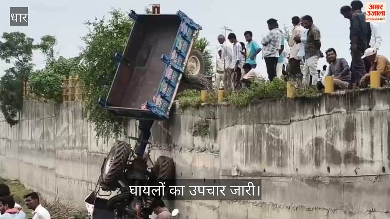 Tractor-trolley falls off bridge near Kadmal;