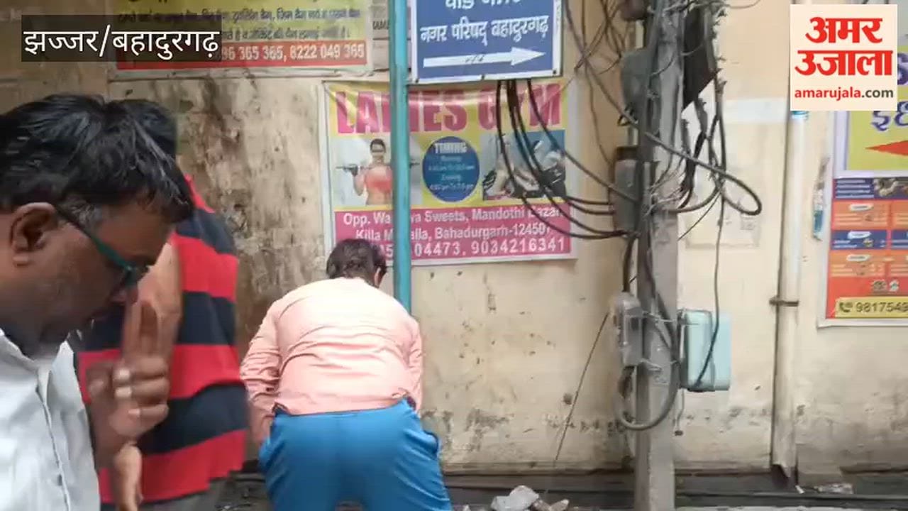 Shopkeepers in Bahadurgarh, troubled by the sanitation workers' strike, took up the brooms themselves.