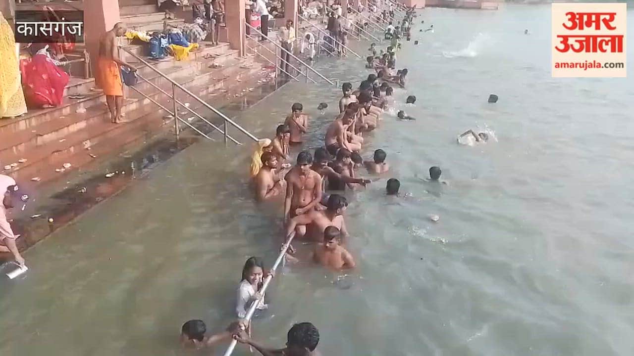 Devotees Take Holy Dip in Ganga on Shravan Purnima