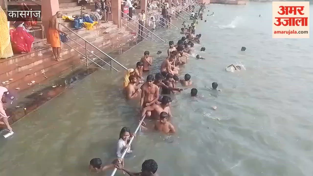 Devotees Take Holy Dip in Ganga on Shravan Purnima