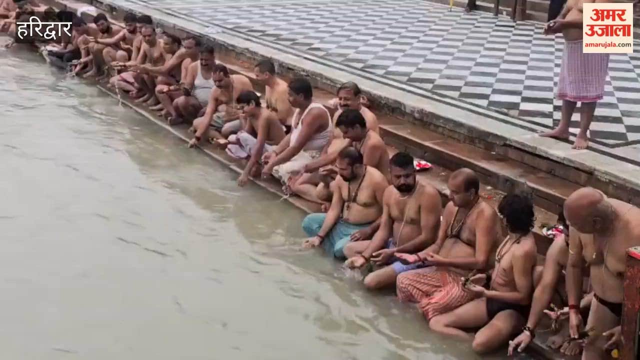 Haridwar On occasion of Shravani Upakarma pilgrim priests performed a holy bath at Har Ki Pauri accompanied by the Hemadri Sankalp ritual