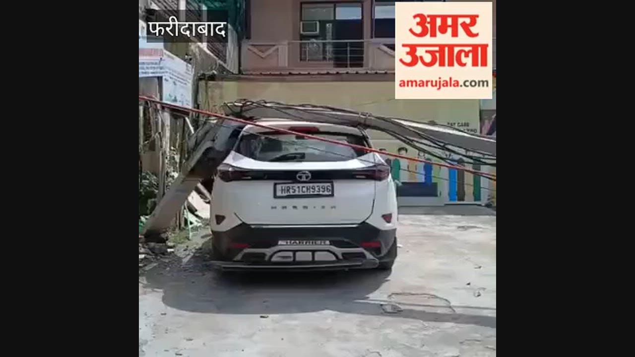 Electricity pole falls on car in Faridabad