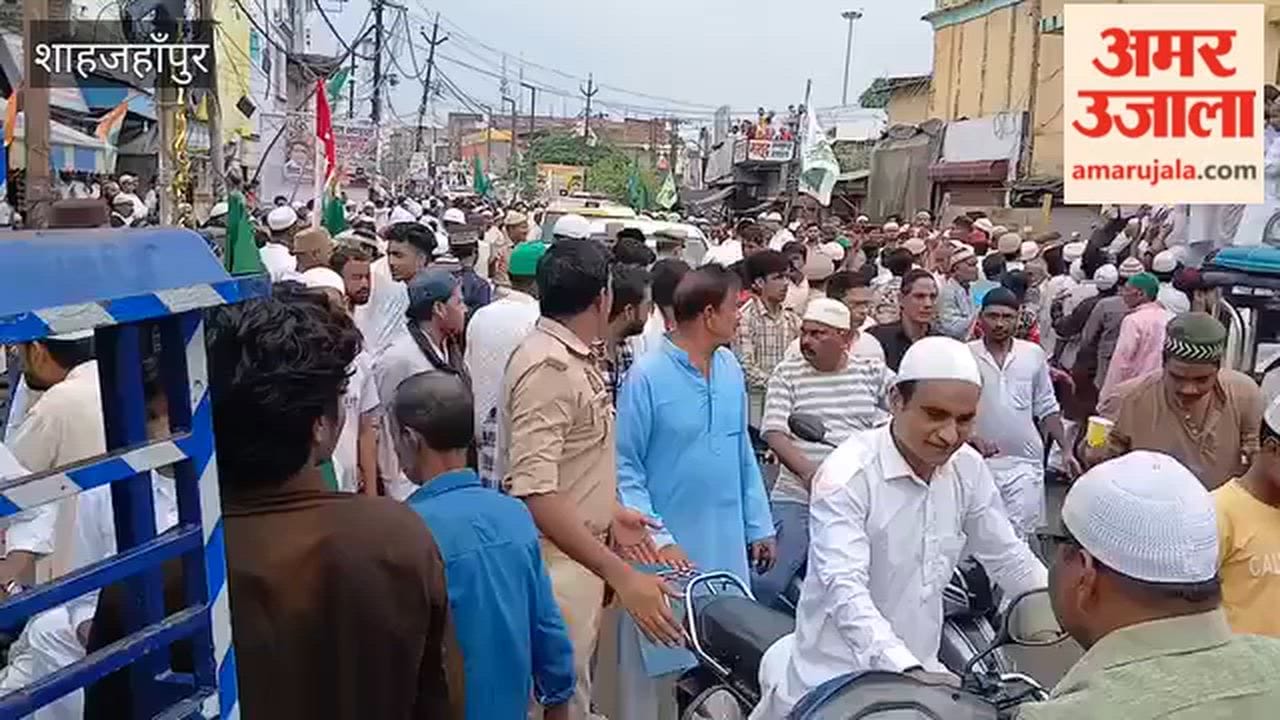 Finance Minister Suresh Khanna's car stuck in a procession in Shahjahanpur