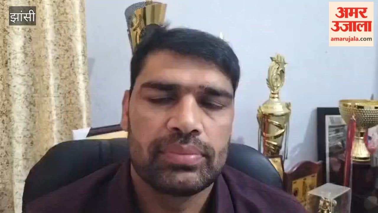 Coach Satish Kumar giving information about selection in the hostel to become a player