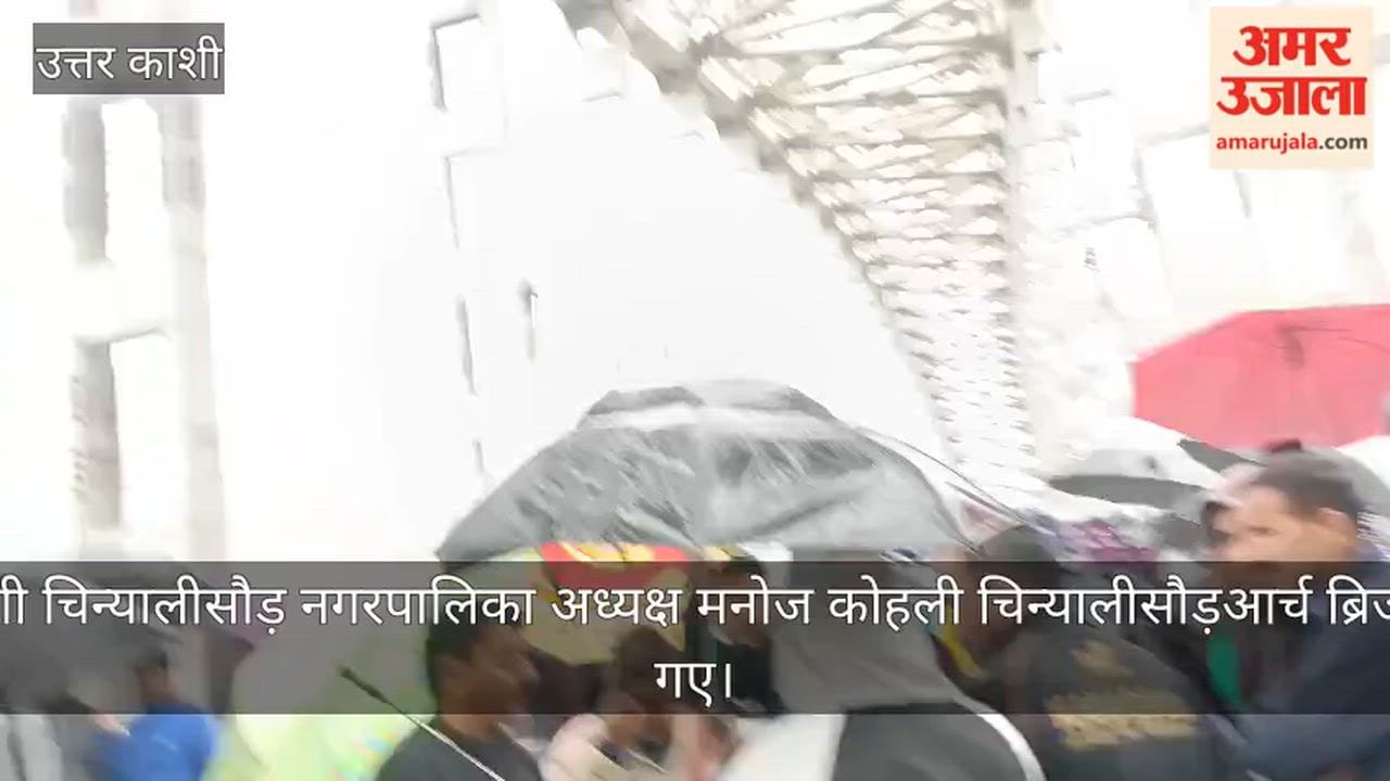 Municipal Council President Climbs onto Bridge in Uttarkashi