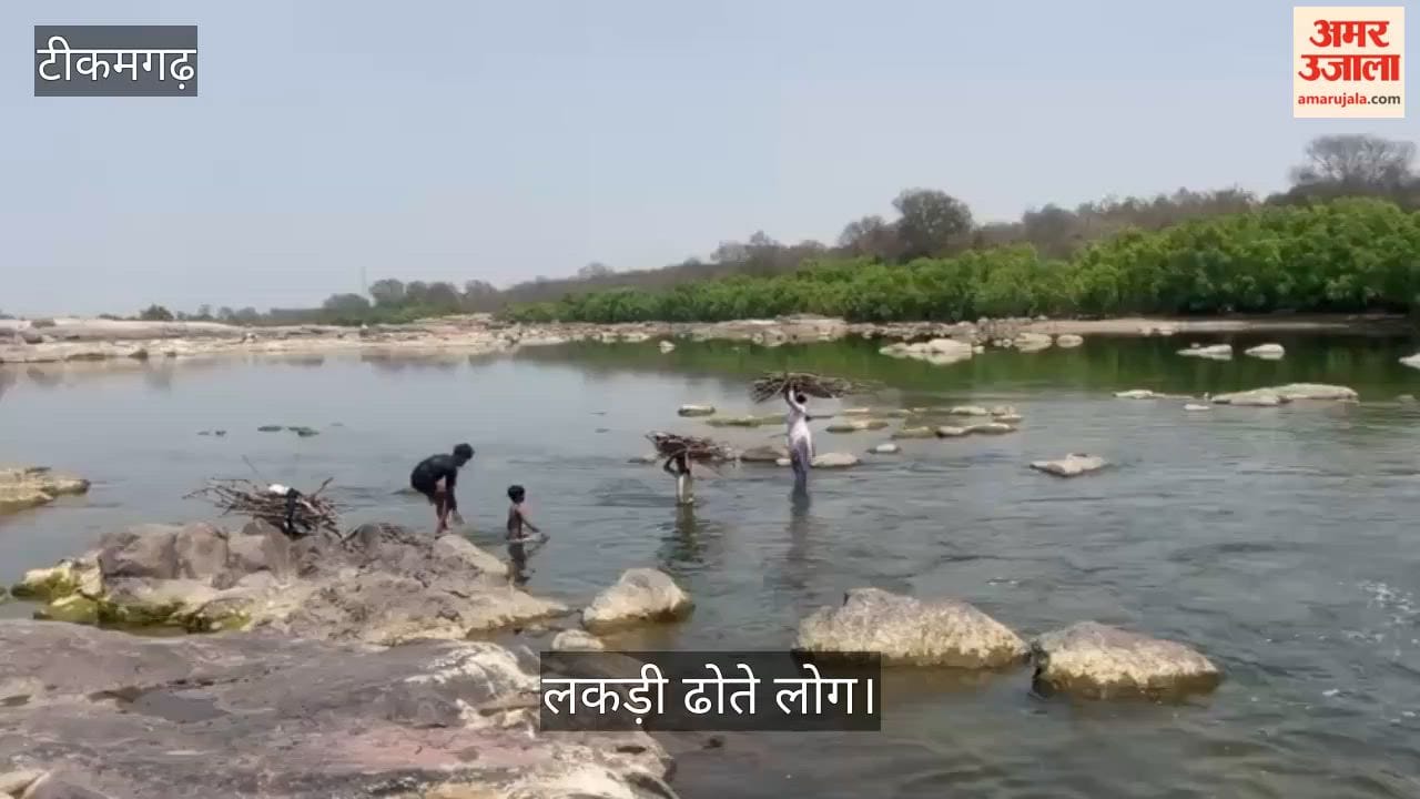 Troubled by a gas shortage, villagers are crossing the river to haul firewood.