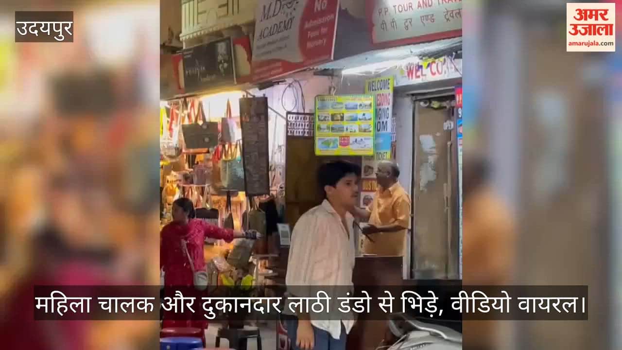 Parking dispute at tourist spot woman driver and shopkeeper clash with sticks video of fight goes viral