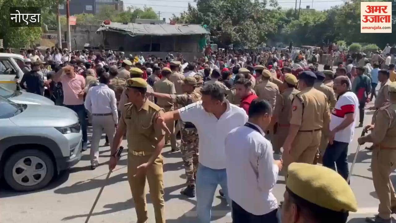 Protesters and police clash over pay hike in Noida