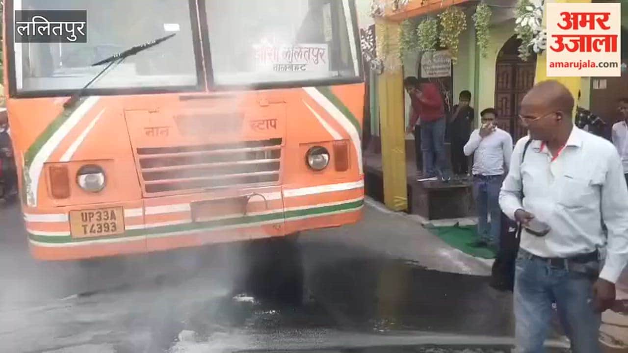 Smoke billowed from the engine of a Jhansi depot bus, causing panic among passengers.