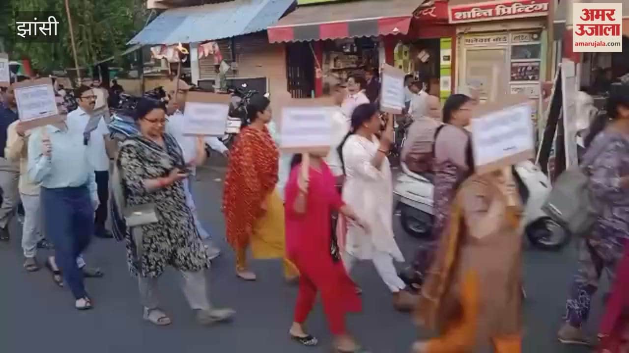 Teachers took out a torchlight procession to protest against TET.