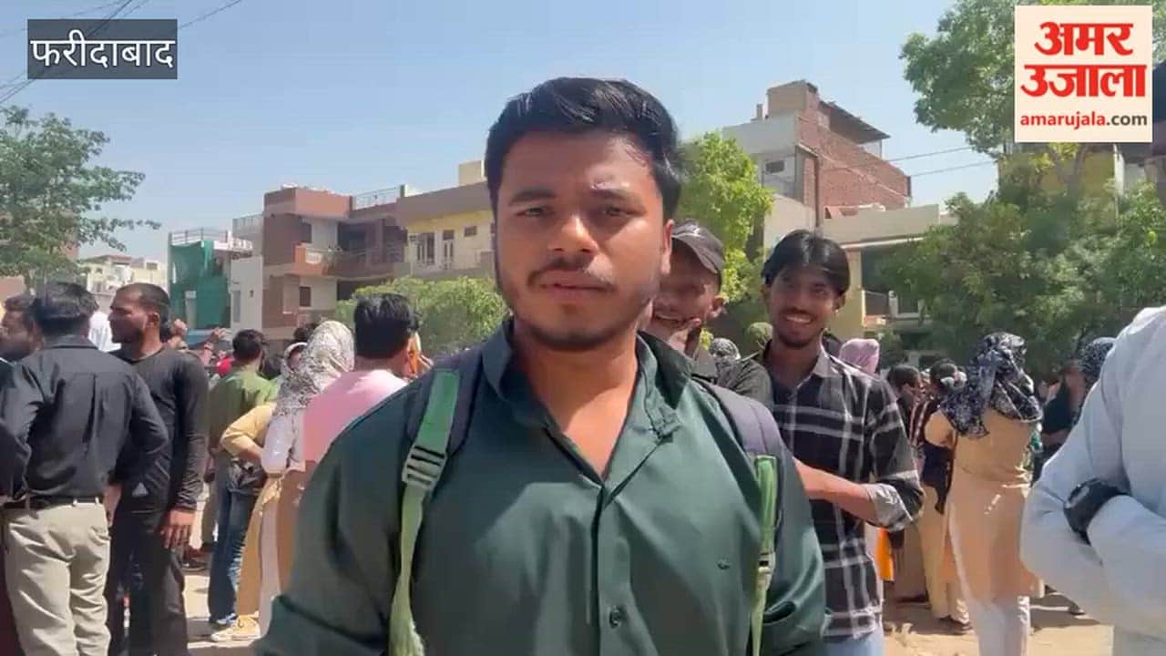 Employees protest outside a company in the Sector 37 area of Faridabad